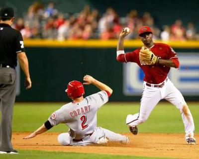 Shortstop has the momentum coming across towards first base.